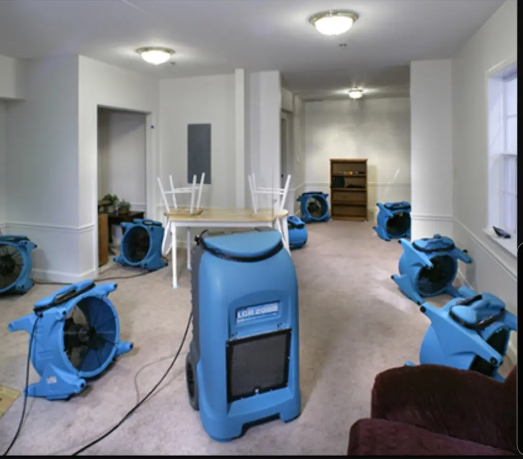 Air movers and dehumidifier setup for Water Extraction & Removal in Benton